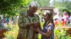 schoolgirl-places-sycamore-gap-seedling-at-chelsea-flower-show